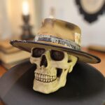 Scorched Earth distressed custom fedora with hand-burned felt and chain