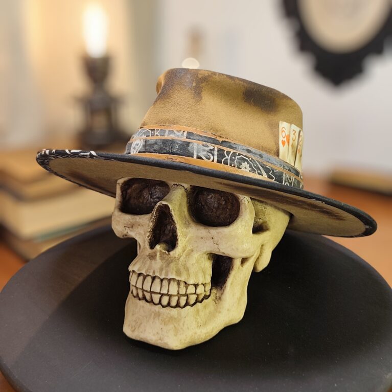 Scorched Earth distressed custom fedora with hand-burned felt and chain